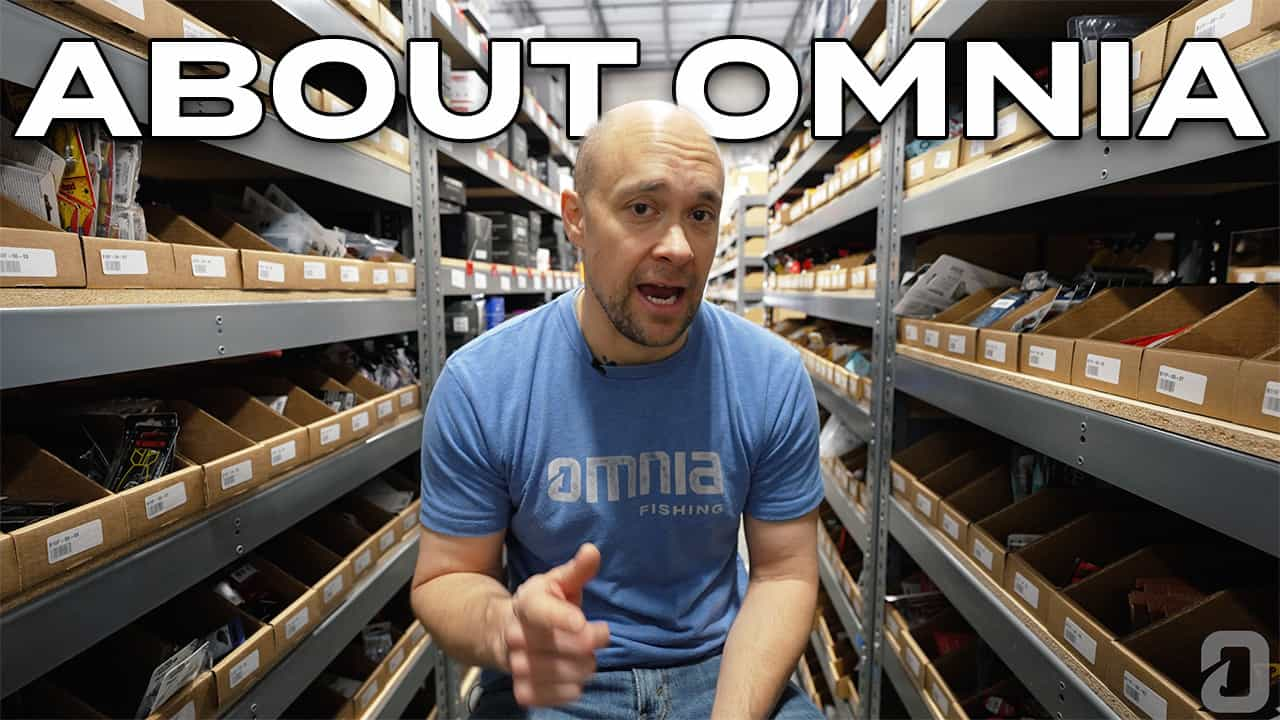 image of man in front of warehouse product bins